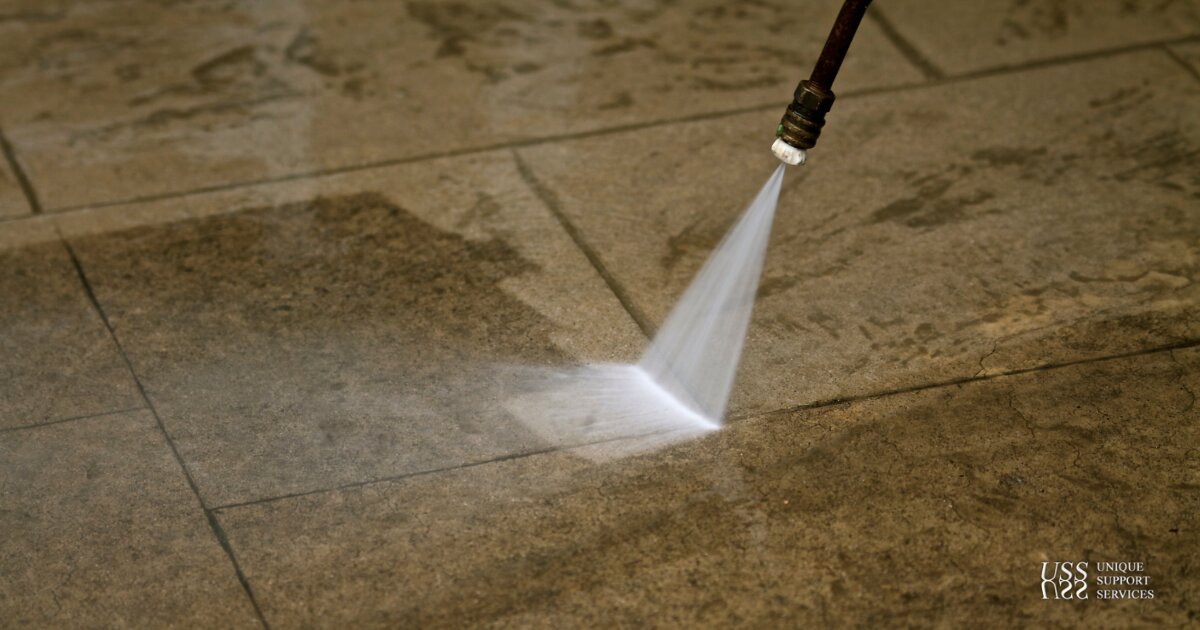 Commercial pressure washing on a paved surface